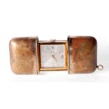 BELART, POCKET TRAVEL CLOCK, silvered square dial with batons and date aperture, in pull apart