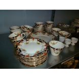 A LATE VICTORIAN 38 PIECE TEA SERVICE AND THREE GERMAN EGG CUPS