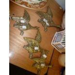 GRADUATED SET OF FOUR CAST BRASS WALL MOUNTED 'FLYING DUCKS' (4)