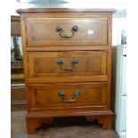 GEORGIAN STYLE MAHOGANY AND YEW WOOD VENEERED BEDSIDE CHEST OF THREE DRAWERS WITH EBONY STRING