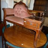 A MID 20TH CENTURY MAHOGANY LADIES TELEPHONE SEAT, THE RAISED SCROLL BACK AND ARM WITH PINK VELVET