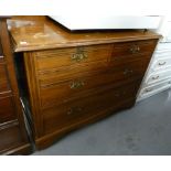 EDWARDIAN MAHOGANY CHEST OF TWO SHORT AND TWO LONG DRAWERS WITH LATERALLY FLUTED FRONTS AND
