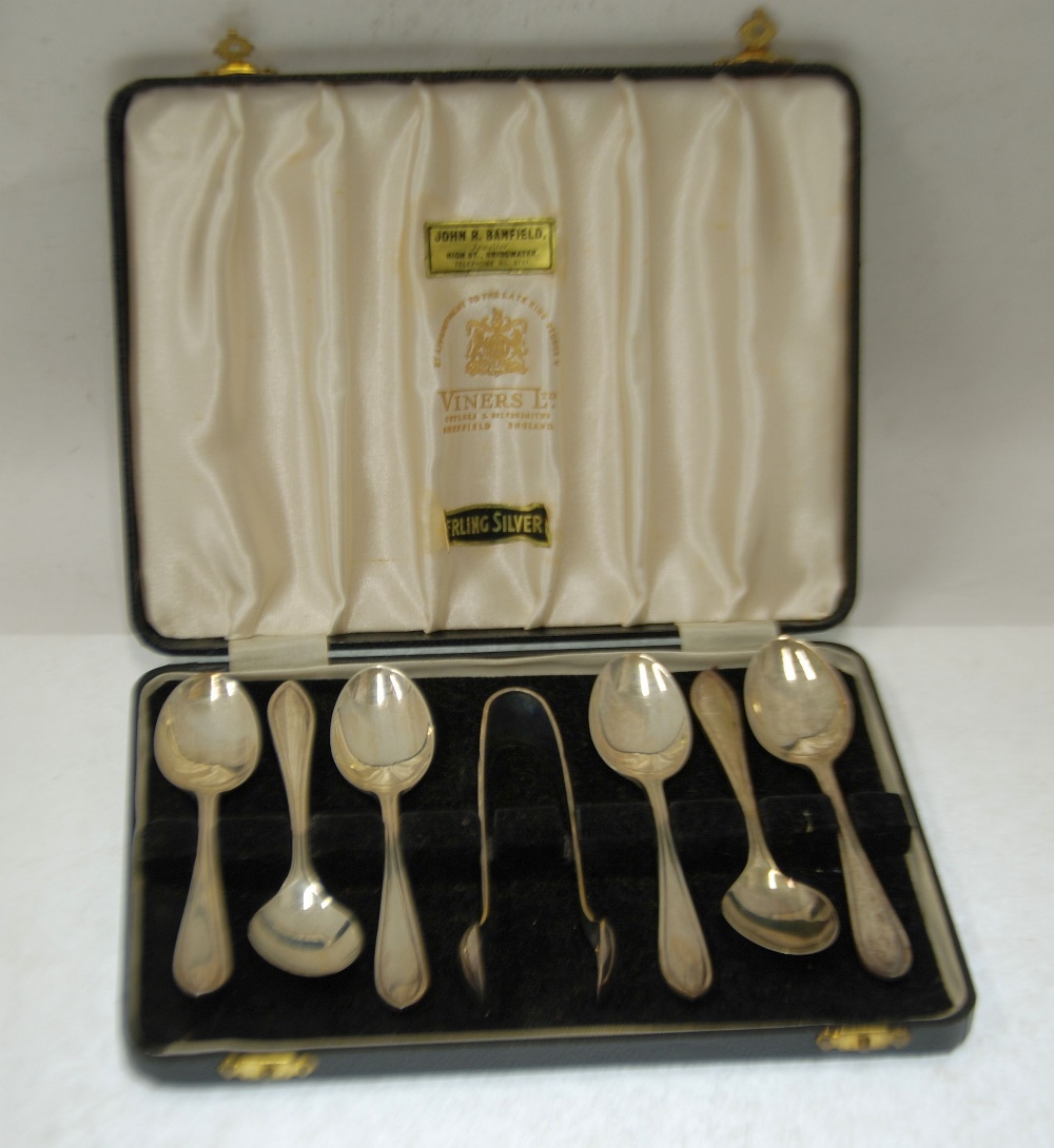 CASED SET OF SIX SILVER TEASPOONS AND MATCHING PAIR OF SUGAR TONGS, by Edward Viner, with pointy