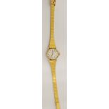 LADY'S ZENITH SWISS ROLLED GOLD WRISTWATCH, with 17 jewelled movement, silvered oval dial with