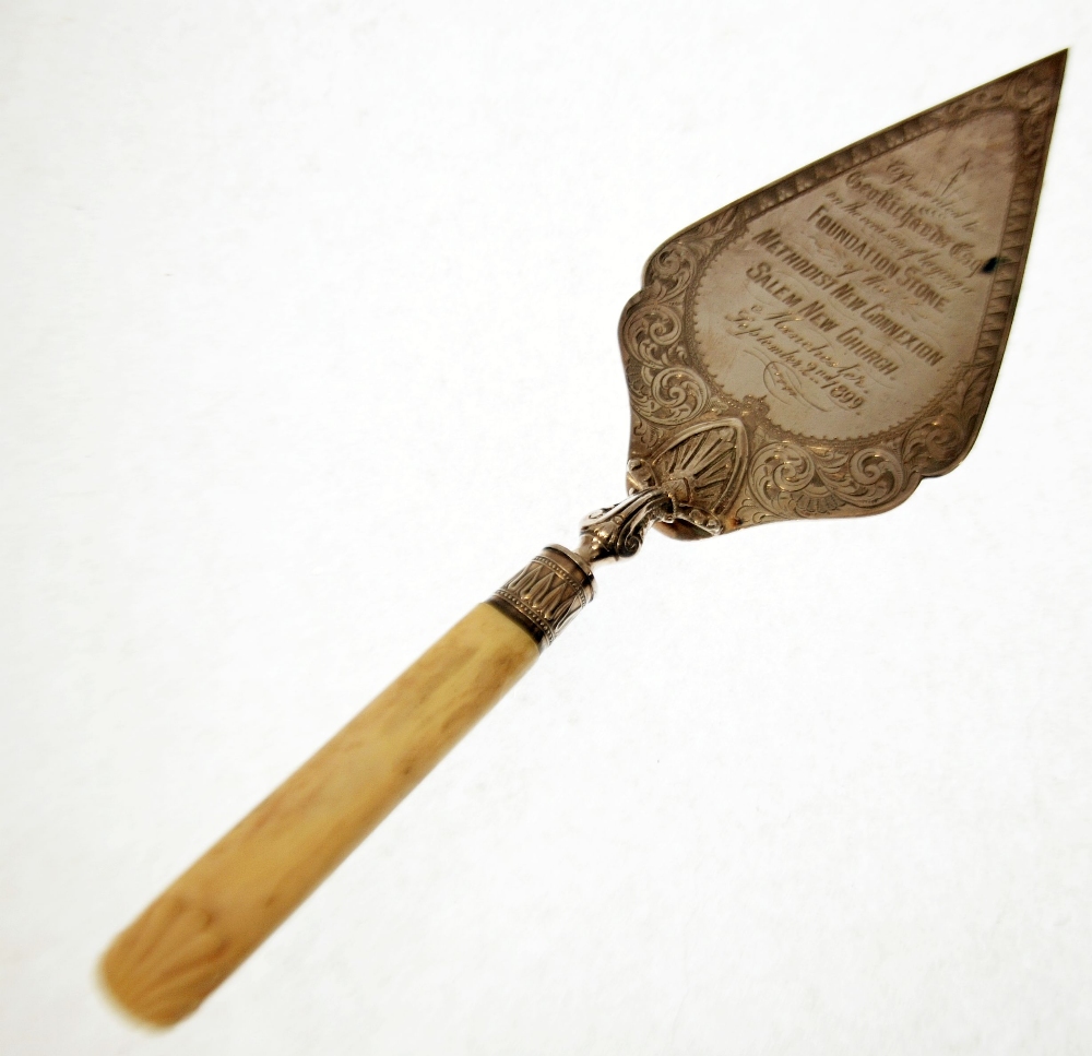 LATE VICTORIAN ENGRAVED SILVER PRESENTATION TROWEL, with carved ivory handle, the diamond shaped