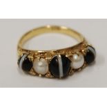 LATE 19th/EARLY 20th CENTURY 18ct GOLD RING with three cabochon banded agate stones and two half