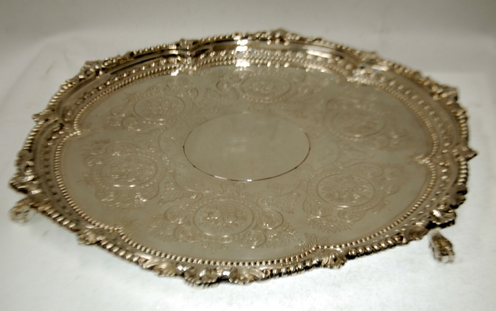 VICTORIAN SILVER WAITER, the centre with a later applied roundel to conceal an engraved