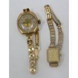 LADY'S ROAMER, SWISS QUARTZ WRIST WATCH, WITH OBLONG DIAL, IN 9ct gold case with presentation