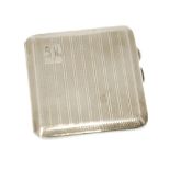 GEORGE V ENGINE TURNED SILVER POCKET CIGARETTE CASE, of canted oblong form, initialled, 3 1/4" x 3