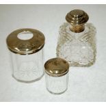 THREE PIECES OF GEORGE V SILVER MOUNTED CUT GLASS COMPRISING; square, swollen PERFUME BOTTLE with