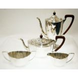 EARLY 20th CENTURY SILVER FOUR PIECE TEA AND COFFEE SERVICE each of shaped oval form, the tea and