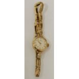 LADY'S AUDAX 'FORTIS' SWISS 9ct GOLD WRISTWATCH with mechanical movement, small circular silvered