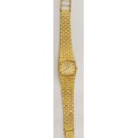 LADY'S BULOVA GOLD PLATED WRISTWATCH, the oblong gold coloured dial with batons, integral bark