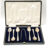 CASED SET OF SIX GEORGE V SILVER BEAD EDGE COFFEE SPOONS AND MATCHING PAIR OF SUGAR TONGS, Sheffield