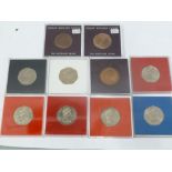 3 UK one penny coins, 1950, 1951 and 1953, in labelled vision cases and 7 Isle of Man 'Christmas'