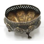 PROBABLY INDIAN SILVER LOBATED SMALL CIRCULAR BOWL, with pierced border and embossed with animals