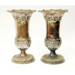 PAIR OF EDWARDIAN SILVER VASES, the thistle shaped bodies with crimped tops and repousse