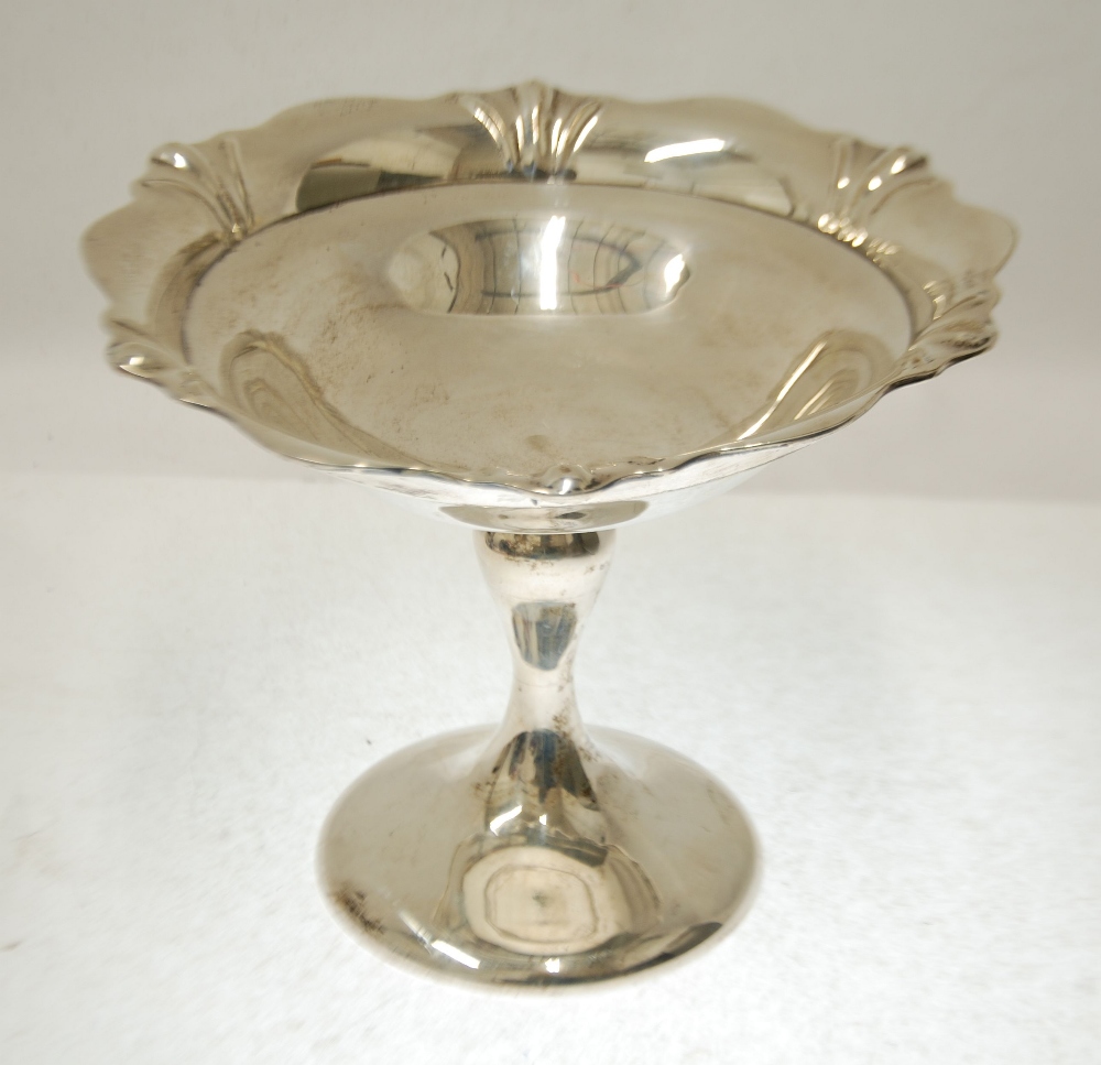 GEORGE V SILVER PEDESTAL FRUIT DISH, with cyma border, baluster column and circular foot, 8" (20.