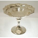 GEORGE V SILVER PEDESTAL FRUIT DISH, with cyma border, baluster column and circular foot, 8" (20.