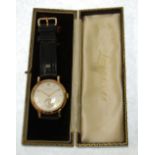 CIRCA 1950 9ct GOLD CASED LONGINES GENTLEMAN'S WRISTWATCH on leather strap, in original gilt