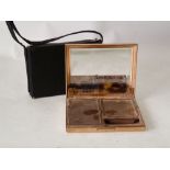 MOTHER OF PEARL INLAY AND PASTE SET GILT METAL POWDER COMPACT, with comb and slip case, 4 ¼" x 3 ½"