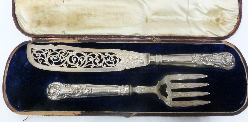 PAIR OF VICTORIAN SILVER FISH SERVERS with Kings pattern handles, the knife with foliate scroll