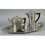 AN ART DECO PLANISHED SILVER PLATED PEWTER 'CRAFTSMAN' OBLONG OCTAGONAL TWO HANDLED TEA TRAY,