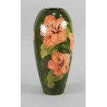 WALTER MOORCROFT 'HIBISCUS' DESIGN TUBE LINED POTTERY VASE, of ovoid form, painted in tones of