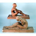 TWO CIRCA 1920's/30's FRENCH TERRACOTTA SEATED FEMALE NUDE STUDIES, each on rectangular plinth base,