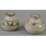 NEAR PAIR OF HARRISON McINTOSH STUDIO POTTERY VASES, of ribbed baluster form with waisted necks,