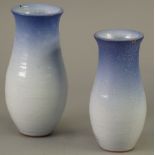 GRADUATED PAIR OF COLIN PEARSON (?) STUDIO POTTERY VASES, of ovoid form, glazed in fading blue, 8