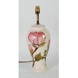 WALTER MOORCROFT MAGNOLIA PATTERN TUBE LINED POTTERY ELECTRIC TABLE LAMP BASE, painted in tones of