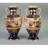 TALL PAIR OF 1930's JAPANESE NORITAKE PORCELAIN TWO HANDLED BALUSTER SHAPE VASES, each with an