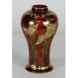 FIELDINGS 'DEVON LUSTRINE' BALUSTER SHAPE VASE, painted with butterflies in gilt and colours and