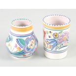 TWO POOLE POTTERY HAND PAINTED SMALL VASES, both in floral designs with dashed rims, one of baluster