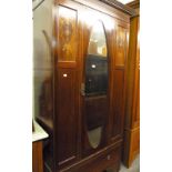 AN EDWARDIAN MAHOGANY MIRROR DOOR SINGLE WARDROBE WITH INLAY DECORATION