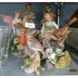 *RESIN GROUP OF TWO CHILDREN ON A BENCH, ANOTHER OF TWO FAIRIES, OTHER ORNAMENTAL GROUPS, TWO 'KONA'