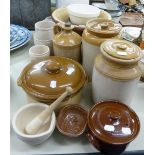 LARGE TERRACOTTA MIXING BOWL, OTHER MIXING BOWL, LARGE STORAGE POTS AND COVERS, A SMALL FLAGON ETC