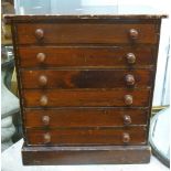 MAHOGANY STAINED PINE APPRENTICE CHEST OF SIX DRAWERS, WITH PLINTH BASE, AND A 1930's FRAMELESS OVAL