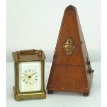 WATERBURY CLOCK CO. AMERICAN PATENTED CARRIAGE CLOCK, of typical form, with white Roman mask and top