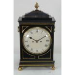 REGENCY EBONISED AND BRASS MOUNTED REPEATING BRACKET CLOCK, the 8" enamelled Roman dial powered by a