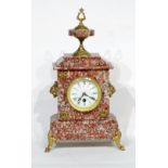 EARLY TWENTIETH CENTURY PINK VEINED MARBLE GILT METAL MOUNTED MANTLE CLOCK, enamelled roman dial,