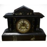 VICTORIAN BLACK SLATE MANTEL CLOCK, the 5" dial with visible brocot escapement to the centre,