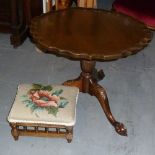 A REPRODUCTION MAHOGANY PIE-CRUST TILT TOP TRIPOD COFFEE TABLE, ALSO A BEECHWOOD FOOTSTOOL WITH