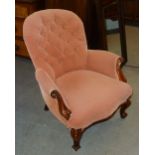 VICTORIAN UPHOLSTERED BUTTON BACK ARMCHAIR WITH WALNUTWOOD SCROLLIATED ARM RESTS AND CABRIOLE