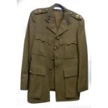 MID 20th CENTURY ROYAL ARTILLERY OFFICER'S KHAKI JACKET, complete with lapel and collar badges and