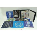 LARGE COIN ALBUM CONTAINING APPROXIMATELY 100 LIGHT METAL ALLOY SOUVENIR MEDALLIONS, mainly from USA