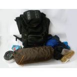 A LARGE 'HIGHLANDER' RUCK SACK CONTAINING A QUANTITY OF CAMPING EQUIPMENT