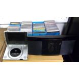 MATSUI PORTABLE DVD PLAYER AND A PANASONIC UPRIGHT CD PLAYER AND A COLLECTION OF CD's