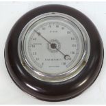 G & C, EARLY TWENTIETH CENTURY BROWN BAKELITE CASE ANEROID WALL BAROMETER, 7" (17.8cm) diameter